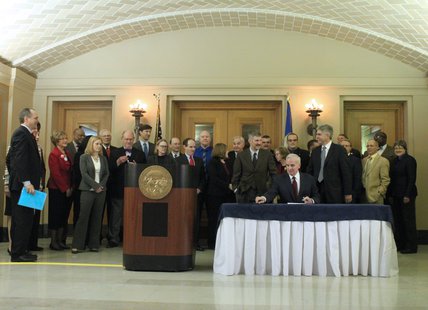 Dayton signs Health Insurance Marketplace bill Dayton signs Health Insurance Marketplace bill