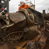 A heat exchanger from an Apollo F-1 engine is seen in this handout photo from Bezos Expeditions taken onboard a recovery ship off the coast A heat exchanger from an Apollo F-1 engine is seen in this handout photo from Bezos Expeditions taken onboard a recovery ship off the coast