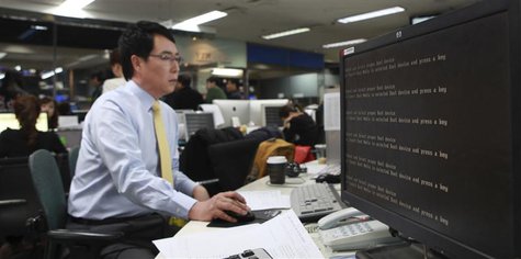 A computer is seen down after hacking at main office of broadcaster YTN in Seoul March 20, 2013. South Korean authorities were investigating A computer is seen down after hacking at main office of broadcaster YTN in Seoul March 20, 2013. South Korean authorities were investigating