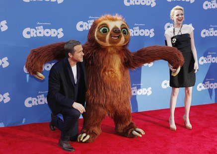 Cast members Ryan Reynolds (L) and Emma Stone arrive for the premiere of the film "The Croods" in New York, March 10, 2013. REUTERS/Carlo Al Cast members Ryan Reynolds (L) and Emma Stone arrive for the premiere of the film "The Croods" in New York, March 10, 2013. REUTERS/Carlo Al