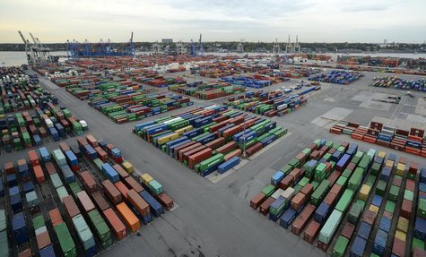 Containers are seen at the container terminal "Burchardkai" of the Hamburger Hafen und Logistik AG (HHLA) in the harbour of Hamburg October Containers are seen at the container terminal "Burchardkai" of the Hamburger Hafen und Logistik AG (HHLA) in the harbour of Hamburg October