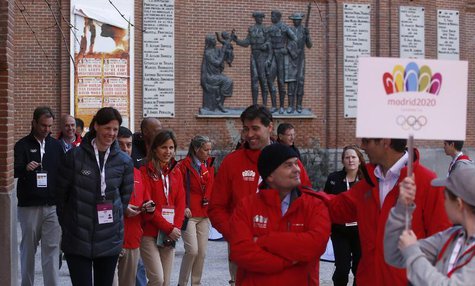 Members of the IOC walk near the Las Ventas bullring in Madrid March 18, 2013. REUTERS/Javier Barbancho Members of the IOC walk near the Las Ventas bullring in Madrid March 18, 2013. REUTERS/Javier Barbancho