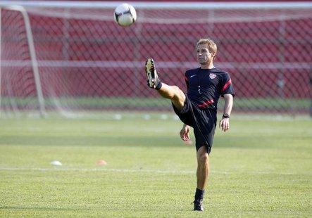 U.S. head coach Juergen Klinsmann kicks the ball during a practice session in San Pedro Sula February 5, 2013. REUTERS/Stringer U.S. head coach Juergen Klinsmann kicks the ball during a practice session in San Pedro Sula February 5, 2013. REUTERS/Stringer