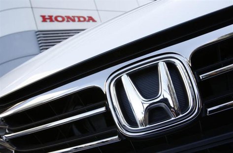 A Honda Odyssey car is displayed outside Honda Motor Co's showroom in Tokyo January 31, 2013. REUTERS/Issei Kato A Honda Odyssey car is displayed outside Honda Motor Co's showroom in Tokyo January 31, 2013. REUTERS/Issei Kato