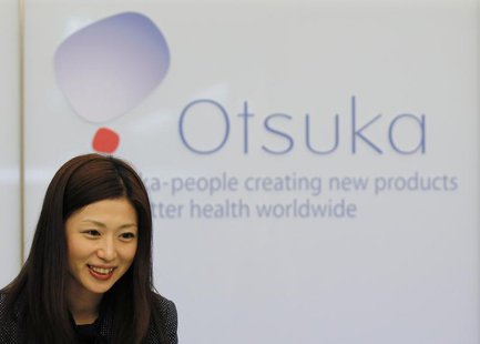 A receptionist works at the Otsuka Holdings Co headquarters in Tokyo December 15, 2010. REUTERS/Toru Hanai A receptionist works at the Otsuka Holdings Co headquarters in Tokyo December 15, 2010. REUTERS/Toru Hanai