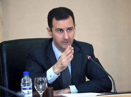 Syria's President Bashar al-Assad heads a cabinet meeting in Damascus, in this handout photograph distributed by Syria's national news agenc Syria's President Bashar al-Assad heads a cabinet meeting in Damascus, in this handout photograph distributed by Syria's national news agenc