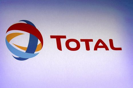 The logo of French oil company Total is pictured during the company's 2012 annual result presentation in Paris February 13, 2013. REUTERS/Ph The logo of French oil company Total is pictured during the company's 2012 annual result presentation in Paris February 13, 2013. REUTERS/Ph