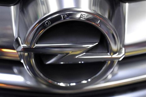 The Opel logo is placed on a Cascada model at an assembly line at the Opel Gliwice factory in southern Poland February 28, 2013. REUTERS/Pet The Opel logo is placed on a Cascada model at an assembly line at the Opel Gliwice factory in southern Poland February 28, 2013. REUTERS/Pet