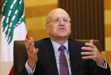 Lebanon's Prime Minister Najib Mikati talks during an interview with Reuters at the Grand Serail, the government headquarters in Beirut Marc Lebanon's Prime Minister Najib Mikati talks during an interview with Reuters at the Grand Serail, the government headquarters in Beirut Marc