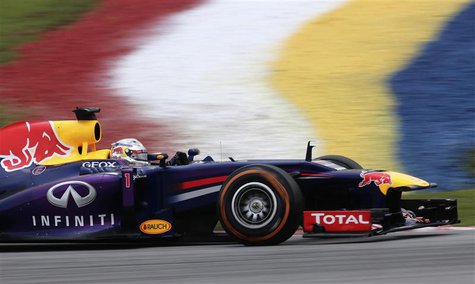 Red Bull Formula One driver Sebastian Vettel of Germany drives during the third practice session of the Malaysian F1 Grand Prix at Sepang In Red Bull Formula One driver Sebastian Vettel of Germany drives during the third practice session of the Malaysian F1 Grand Prix at Sepang In