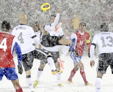 Geoff Cameron (C) of the U.S. kicks the ball next to team mate Michael Bradley (4) while playing against Costa Rica during their 2014 World Geoff Cameron (C) of the U.S. kicks the ball next to team mate Michael Bradley (4) while playing against Costa Rica during their 2014 World