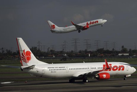 A Lion Air airplane takes off at Soekarno-Hatta airport in Jakarta March 18, 2013. REUTERS/Beawiharta A Lion Air airplane takes off at Soekarno-Hatta airport in Jakarta March 18, 2013. REUTERS/Beawiharta