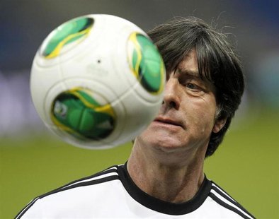 Germany's national soccer team head coach Joachim Loew attends a training session ahead of their 2014 World Cup qualifying soccer match agai Germany's national soccer team head coach Joachim Loew attends a training session ahead of their 2014 World Cup qualifying soccer match agai