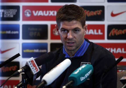 England captain Steven Gerrard attends a media conference at a hotel in London February 5, 2013. England are due to play a friendly soccer m England captain Steven Gerrard attends a media conference at a hotel in London February 5, 2013. England are due to play a friendly soccer m