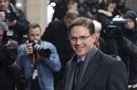 Finland's Prime Minister Jyrki Katainen arrives at the EU council headquarters for an European Union leaders summit meeting to discuss the E Finland's Prime Minister Jyrki Katainen arrives at the EU council headquarters for an European Union leaders summit meeting to discuss the E