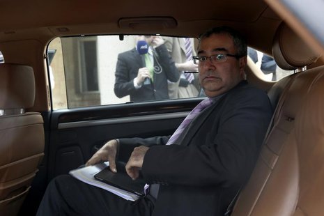 Cyprus Central Bank Governor Panicos Demetriades leaves the presidential palace in Nicosia March 21, 2013. REUTERS/Yorgos Karahalis Cyprus Central Bank Governor Panicos Demetriades leaves the presidential palace in Nicosia March 21, 2013. REUTERS/Yorgos Karahalis