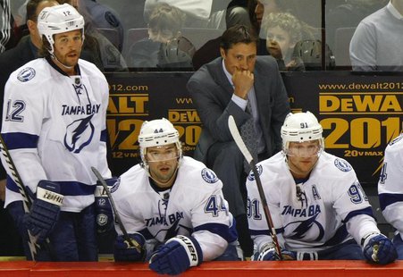 Tampa Bay Lightning head coach Guy Boucher reacts at the end of the second period of NHL hockey action in Montreal, April 4, 2012. REUTERS/O Tampa Bay Lightning head coach Guy Boucher reacts at the end of the second period of NHL hockey action in Montreal, April 4, 2012. REUTERS/O