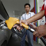 A gas station worker adds fuel into a car at a fuel station in Jakarta in this December 14, 2010 file photo. REUTERS/Enny Nuraheni/Files A gas station worker adds fuel into a car at a fuel station in Jakarta in this December 14, 2010 file photo. REUTERS/Enny Nuraheni/Files