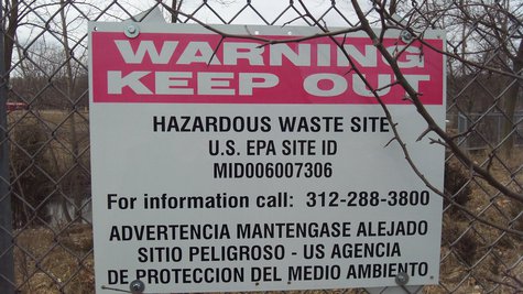 The area remains fenced off to the public with warnings to stay out. The area remains fenced off to the public with warnings to stay out.