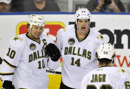 Dallas Stars' Brenden Morrow (L), Jamie Benn and Jaromir Jagr (R) celebrate a goal against the Edmonton Oilers during the second period of t Dallas Stars' Brenden Morrow (L), Jamie Benn and Jaromir Jagr (R) celebrate a goal against the Edmonton Oilers during the second period of t