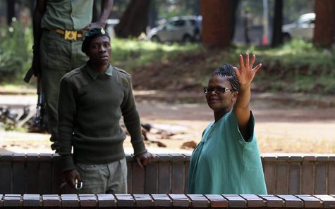 Zimbabwe's Lawyers For Human Rights (ZLHR) Board Member Beatrice Mtetwa waves as she arrives at Harare Magistrates Court, March 20, 2013. RE Zimbabwe's Lawyers For Human Rights (ZLHR) Board Member Beatrice Mtetwa waves as she arrives at Harare Magistrates Court, March 20, 2013. RE