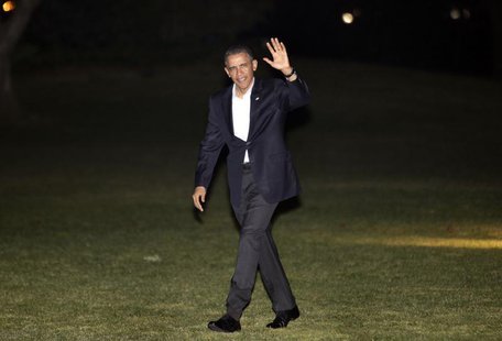 U.S. President Barack Obama waves as he walks on the South Lawn of the White House upon his return to Washington after a trip to Israel, Mar U.S. President Barack Obama waves as he walks on the South Lawn of the White House upon his return to Washington after a trip to Israel, Mar
