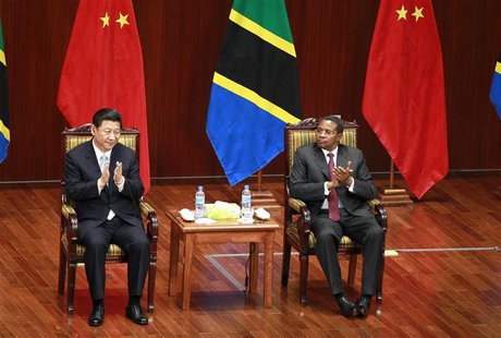 China's President Xi Jinping (L) and his Tanzanian counterpart Jakaya Kikwete (R) attend the opening ceremony of the Julius Nyerere Internat China's President Xi Jinping (L) and his Tanzanian counterpart Jakaya Kikwete (R) attend the opening ceremony of the Julius Nyerere Internat