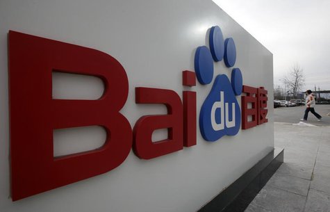 A woman walks past the company logo of Baidu at its headquarters in Beijing February 10, 2010. REUTERS/Jason Lee A woman walks past the company logo of Baidu at its headquarters in Beijing February 10, 2010. REUTERS/Jason Lee