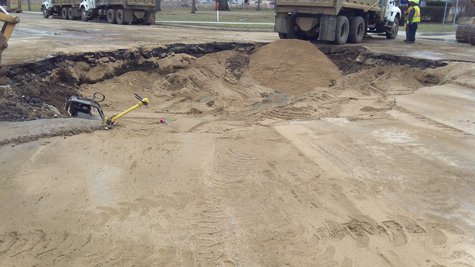 This big hole has since been filled in and paved over. This big hole has since been filled in and paved over.