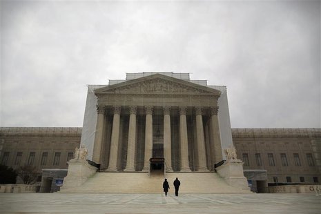 People walk in front of the Supreme Court building in Washington, March 24, 2013. REUTERS/Jonathan Ernst People walk in front of the Supreme Court building in Washington, March 24, 2013. REUTERS/Jonathan Ernst