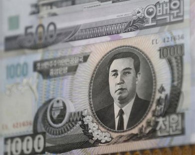 North Korean bank note are seen at a pavilion, just south of the border between the two Koreas, in Paju, north of Seoul, February 15, 2013. North Korean bank note are seen at a pavilion, just south of the border between the two Koreas, in Paju, north of Seoul, February 15, 2013.