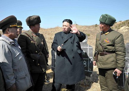 North Korean leader Kim Jong-un (C) inspects the second battalion under the Korean People's Army Unit 1973, honoured with the title of "O Ju North Korean leader Kim Jong-un (C) inspects the second battalion under the Korean People's Army Unit 1973, honoured with the title of "O Ju