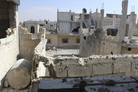Damaged buildings are seen in Baba Amr neighbourhood of Homs June 28, 2012. REUTERS/Nader Al Husseini/Shaam News Network/Handout Damaged buildings are seen in Baba Amr neighbourhood of Homs June 28, 2012. REUTERS/Nader Al Husseini/Shaam News Network/Handout