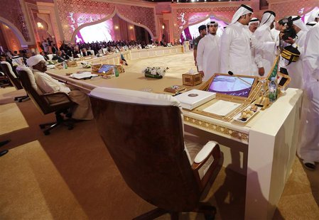 Sudan's President Omar Hassan al-Bashir (L) looks on during the opening of the Arab League summit n Doha, Qatar, March 26, 2013. REUTERS/Ahm Sudan's President Omar Hassan al-Bashir (L) looks on during the opening of the Arab League summit n Doha, Qatar, March 26, 2013. REUTERS/Ahm