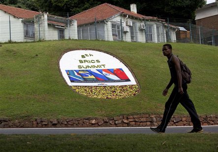 A man walks past a floral display announcing the 5th BRICS Summit in Durban, March 25, 2013. REUTERS/Rogan Ward A man walks past a floral display announcing the 5th BRICS Summit in Durban, March 25, 2013. REUTERS/Rogan Ward