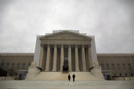 People walk in front of the Supreme Court building in Washington, March 24, 2013. REUTERS/Jonathan Ernst People walk in front of the Supreme Court building in Washington, March 24, 2013. REUTERS/Jonathan Ernst