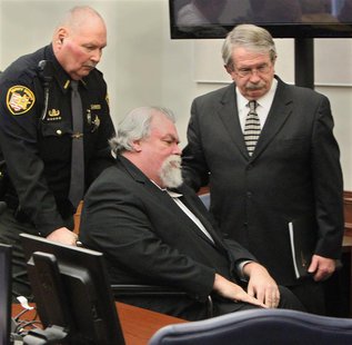 Defense attorney Lawrence J. Whitney (R) accompanies convicted Craigslist murderer Richard Beasley after the jury recommended the death pena Defense attorney Lawrence J. Whitney (R) accompanies convicted Craigslist murderer Richard Beasley after the jury recommended the death pena