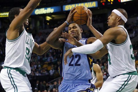Memphis Grizzlies forward Rudy Gay (C) drives to the basket between Boston Celtics center Jason Collins (L) and forward Paul Pierce in the f Memphis Grizzlies forward Rudy Gay (C) drives to the basket between Boston Celtics center Jason Collins (L) and forward Paul Pierce in the f