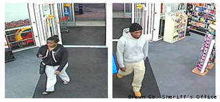 This surveillance photo shows a man and woman suspected of using another person's credit cards at two CVS pharmacies in Brown County, March 12, 2013. This surveillance photo shows a man and woman suspected of using another person's credit cards at two CVS pharmacies in Brown County, March 12, 2013.