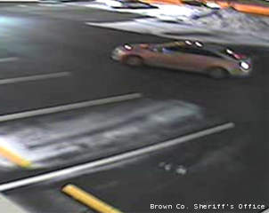 This surveillance photo shows a car used by a man and woman suspected of using another person's credit cards at two CVS pharmacies in Brown County, March 12, 2013. This surveillance photo shows a car used by a man and woman suspected of using another person's credit cards at two CVS pharmacies in Brown County, March 12, 2013.