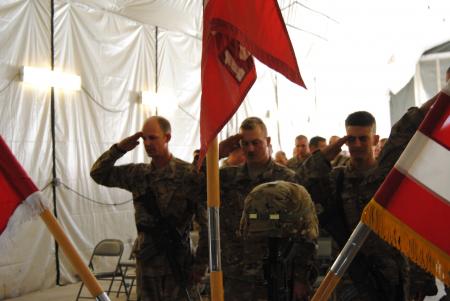 photo by Jessica Jackson
Members of 2nd Platoon, 1433rd Engineer Company, salute the memorial stand of U.S. Army Sgt. Kyle McClain at a memorial ceremony, Aug. 6. McClain was killed in action by an explosion while conducting a route clearance patrol Aug. 1.
photo by Jessica Jackson
Members of 2nd Platoon, 1433rd Engineer Company, salute the memorial stand of U.S. Army Sgt. Kyle McClain at a memorial ceremony, Aug. 6. McClain was killed in action by an explosion while conducting a route clearance patrol Aug. 1.