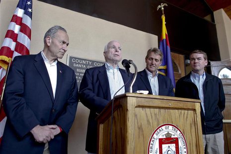 U.S. Senators (L-R) Chuck Schumer (D-NY), John McCain (R-AZ), Jeff Flake (R-AZ) and Michael Bennet (D-CO) hold a news conference following t U.S. Senators (L-R) Chuck Schumer (D-NY), John McCain (R-AZ), Jeff Flake (R-AZ) and Michael Bennet (D-CO) hold a news conference following t