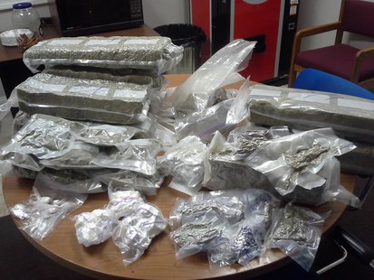 Oshkosh police say $128,000 worth of heroin, cocaine, marijuana and other drugs were seized as part of the four-month-long investigation, Wednesday, March 27, 2013. Oshkosh police say $128,000 worth of heroin, cocaine, marijuana and other drugs were seized as part of the four-month-long investigation, Wednesday, March 27, 2013.