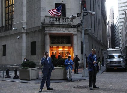 Traders stand outside the New York Stock Exchange prior to the opening bell October 31, 2012. REUTERS/Brendan McDermid Traders stand outside the New York Stock Exchange prior to the opening bell October 31, 2012. REUTERS/Brendan McDermid