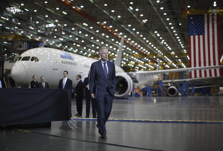 Boeing CEO Jim McNerney waits to be introduced to speak, in front of a Boeing 787 Dreamliner under construction as U.S. President Barack Oba Boeing CEO Jim McNerney waits to be introduced to speak, in front of a Boeing 787 Dreamliner under construction as U.S. President Barack Oba