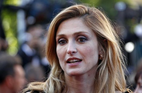 French actress Julie Gayet arrives on the red carpet for the screening of the film "Moonrise Kingdom", by director Wes Anderson, in competit French actress Julie Gayet arrives on the red carpet for the screening of the film "Moonrise Kingdom", by director Wes Anderson, in competit