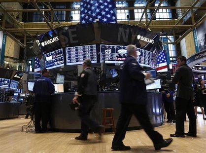 Traders work on the floor at the New York Stock Exchange, March 15, 2013. REUTERS/Brendan McDermid Traders work on the floor at the New York Stock Exchange, March 15, 2013. REUTERS/Brendan McDermid