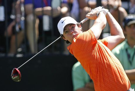 Northern Ireland's Rory McIlroy tees off on the first hole during second round play in the 2013 WGC-Cadillac Championship PGA golf tournamen Northern Ireland's Rory McIlroy tees off on the first hole during second round play in the 2013 WGC-Cadillac Championship PGA golf tournamen