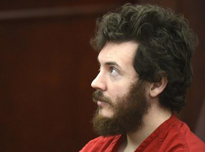 Accused Aurora theater shooting suspect James Holmes listens at his arraignment in Centennial, Colorado March 12, 2013. REUTERS/R.J. Sangost Accused Aurora theater shooting suspect James Holmes listens at his arraignment in Centennial, Colorado March 12, 2013. REUTERS/R.J. Sangost