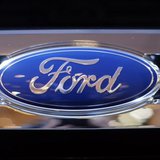 A Ford logo is seen on a car during a press preview at the 2013 New York International Auto Show in New York, March 28, 2013. REUTERS/Mike S